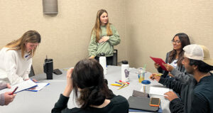 Photo of a group of teens at phase 1 of peer counselor training.